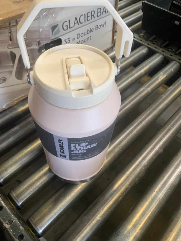 Photo 1 of Stanley IceFlow Flip Straw Jug with Handle 96 oz| Twist On Lid and Flip Up Straw | Leak Resistant for Travel and Sports | Insulated Stainless Steel | BPA-Free | Rose Quartz