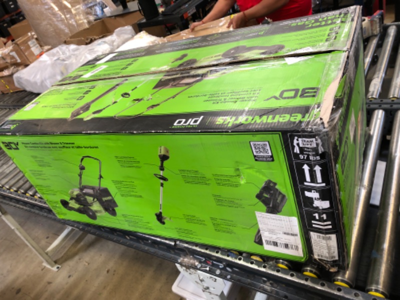 Photo 1 of Greenworks 80V 21” Brushless (Push) Cordless Electric Lawn Mower + (500 CFM) Axial Leaf Blower + 13” String Trimmer (75+ Compatible Tools), (2) 2.0Ah Batteries and 30 Minute Rapid Charger