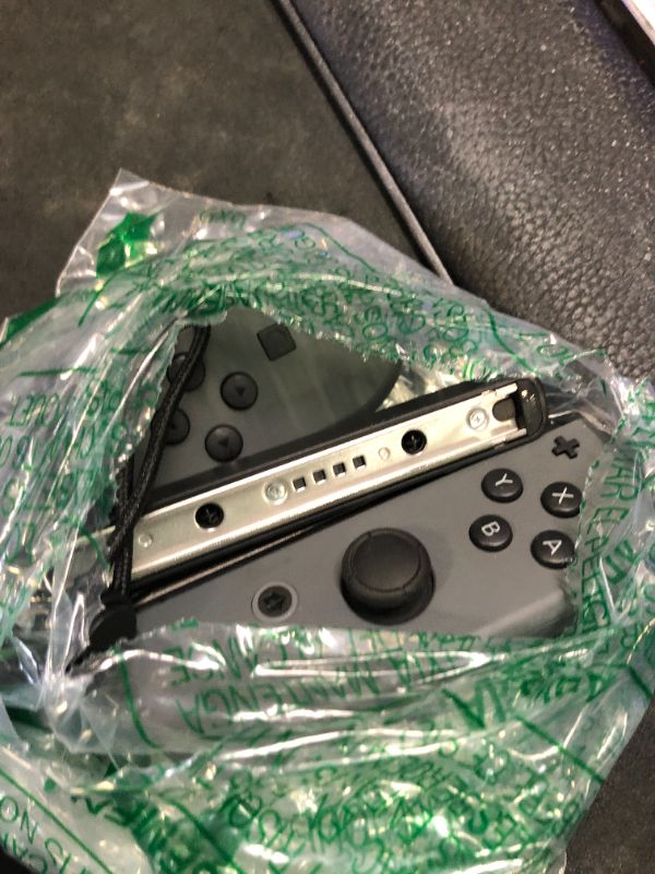 Photo 1 of Nintendo Switch Joy-Con (L/R) Gaming Controller, Gray (Renewed)