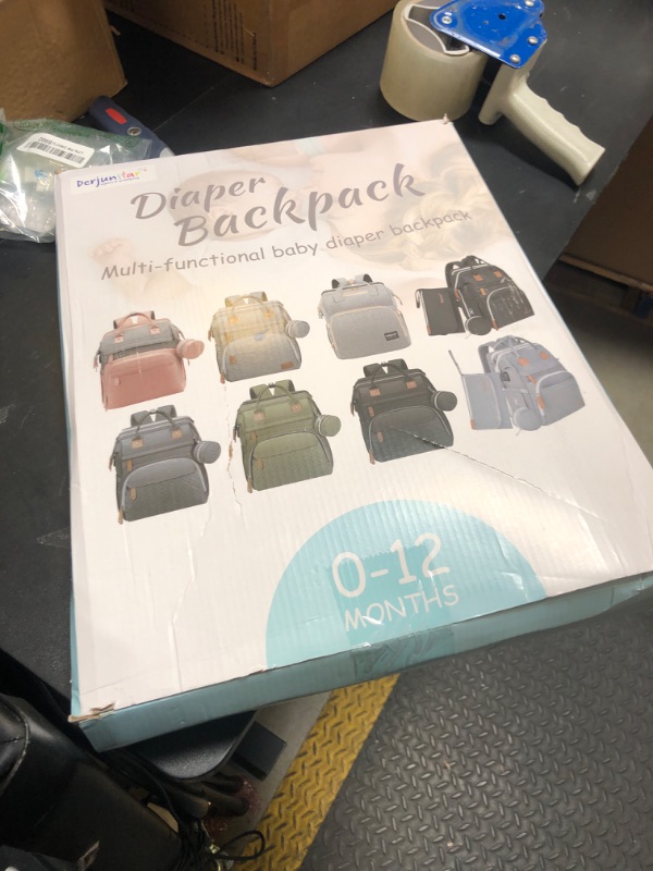 Photo 1 of DERJUNSTAR Baby Diaper Bag Backpack with ChangingStation-Large Capacity Baby Bag for Boys & Girls, USBCharging Port, Pacifier Case, sunshade & Toy Bar,Waterproof? Ash Grey