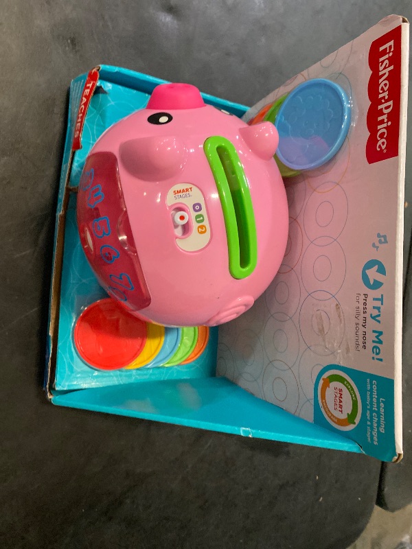 Photo 1 of Fisher-Price Baby & Toddler Toy Laugh & Learn Smart Stages Piggy Bank with Learning Songs & Phrases for Infants Ages 6+ Months