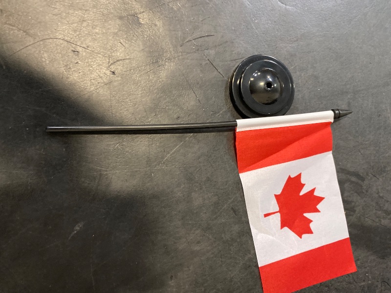 Photo 1 of Anley Canada Deluxe Desk Flag Set - 6 x 4 Inch Miniature Canadian Desktop Flag with 12" Solid Pole - Vivid Color and Fade Resistant - Black Base and Spear Top