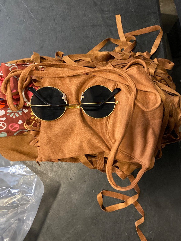 Photo 1 of Size M SOMSOC 7 Pieces 70s Women Hippie Costume Set Includes Fringe Vest Bag Pants Headband Peace Sign Necklace Earrings Sunglasses for Halloween (Brown)