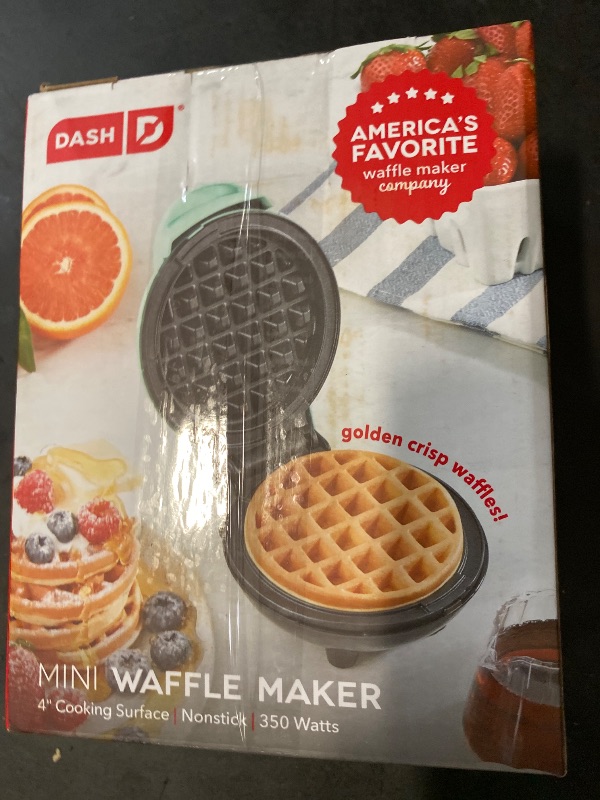 Photo 1 of DASH Mini Waffle Maker - 4” Waffle Mold, Nonstick Waffle Iron with Quick Heat-Up, PTFE Nonstick Surface - Perfect Mini Waffle Maker for Kids and Families, Just Add Batter (Aqua)