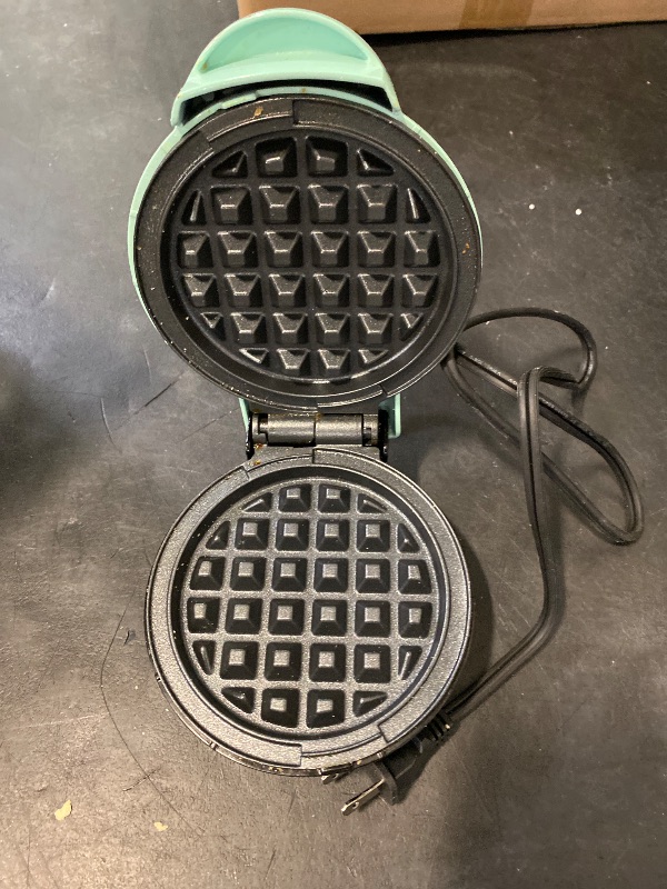 Photo 1 of DASH Mini Waffle Maker - 4” Waffle Mold, Nonstick Waffle Iron with Quick Heat-Up, PTFE Nonstick Surface - Perfect Mini Waffle Maker for Kids and Families, Just Add Batter (Aqua)