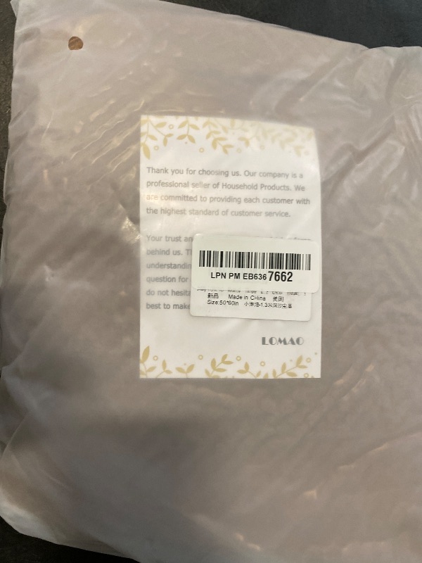 Photo 1 of LOMAO Knitted Throw Blanket with Tassels Bubble Textured Soft Blanket Lightweight Warm Throws for Couch Cover Home Decor (Khaki, 50x60)