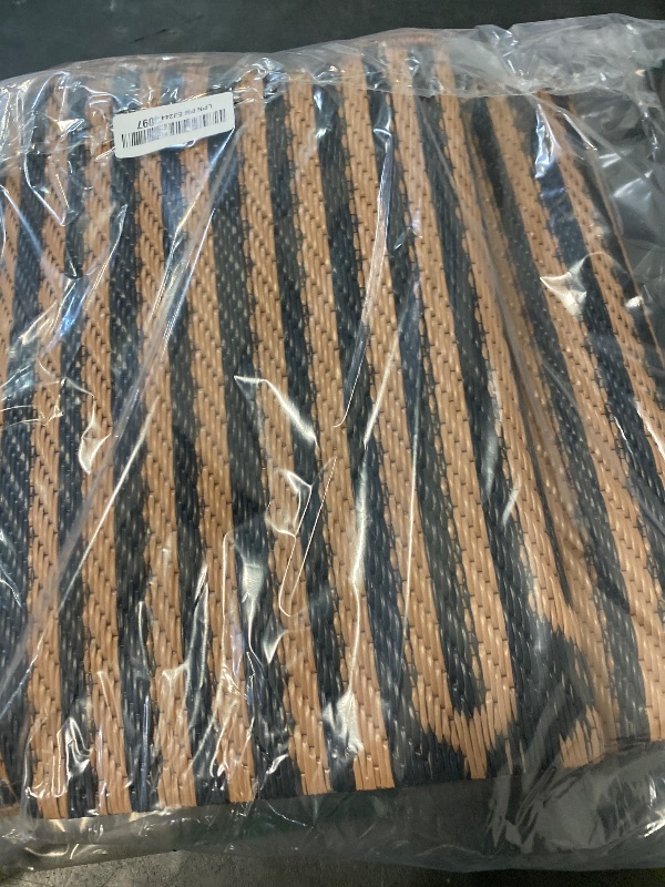 Photo 1 of MontVoo Outdoor Rug-Waterproof Patio Rug Mat 5x8 Outdoor Carpet Mat Reversible Plastic Straw Outside Outdoor Rug for RV Camping Picnic Balcony Backyard Pool Deck Porch Modern Boho Black Brown