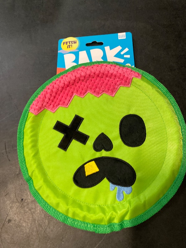 Photo 1 of BARK Halloween Disc-Gusting Dwayne Zombie Dog Flying Disc Toy