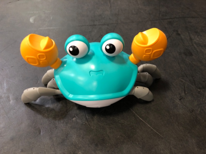 Photo 1 of OSPNIEEK Crawling Crab Baby Toy 2.0 -Sound Mute & Speed Control, Infant Tummy Time Rechargeable Music Light Walking Sensory Birthday Gift for 3 4 5 6 7 8 9 10 11 12 Boy Girl 6-12 Months Toddler, Green