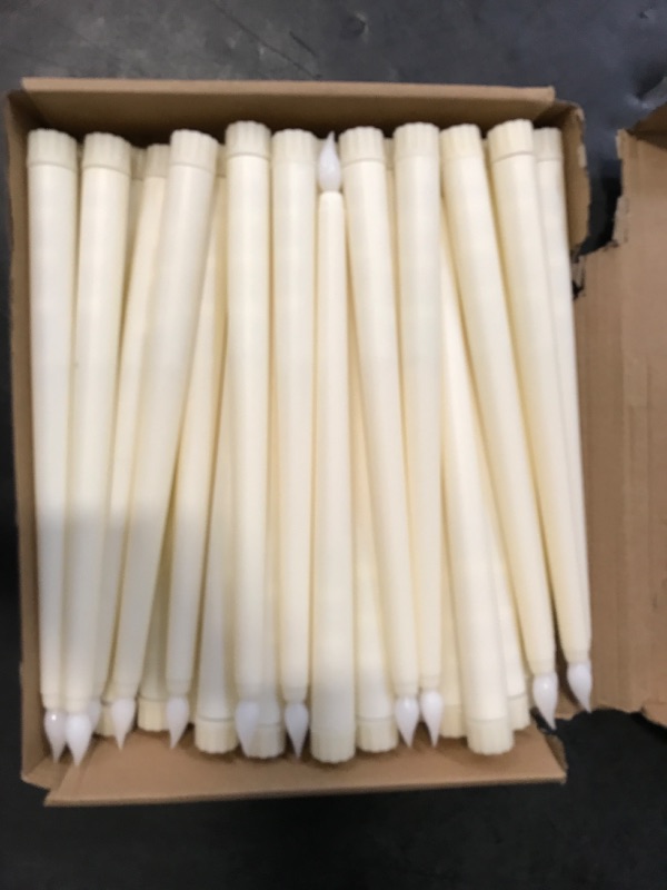 Photo 1 of Treela 36 Pieces Flameless Taper Candles 11 Inch Flickering Faux LED Battery Operated Electric Fake Candles for Christmas Halloween Birthday Wedding Party Supplies(Ivory)