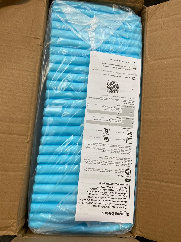 Photo 1 of Amazon Basics Absorbent Dog and Puppy Pee Pads with 5-Layer Leak-Proof Design and Quick-Dry Surface for Potty Training, Heavy Duty Absorbency, Giant, 27.5 x 44 Inch - Pack of 30, Blue & White