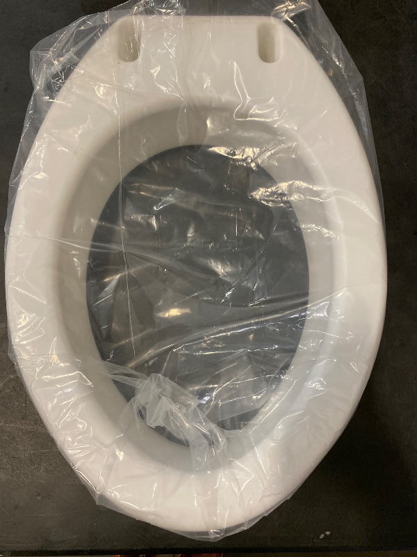 Photo 1 of Carex Toilet Seat Riser, Elongated Raised Toilet Seat Adds 3.5 inches to Toilet Height, for Assistance Bending or Sitting, 300 Pound Weight Capacity Toilet Riser