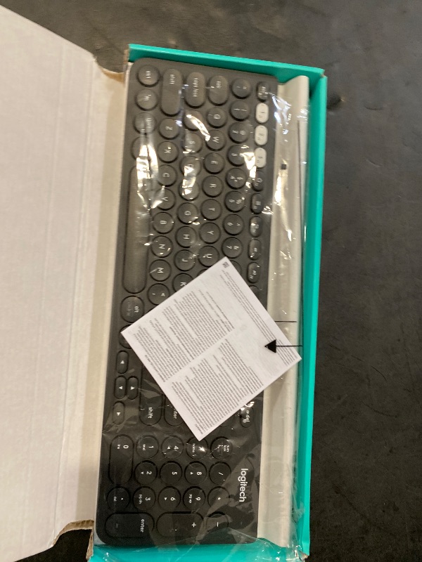Photo 1 of Logitech K780 Multi-Device Wireless Keyboard for Computer, Phone and Tablet – FLOW Cross-Computer Control Compatible - Speckles, White