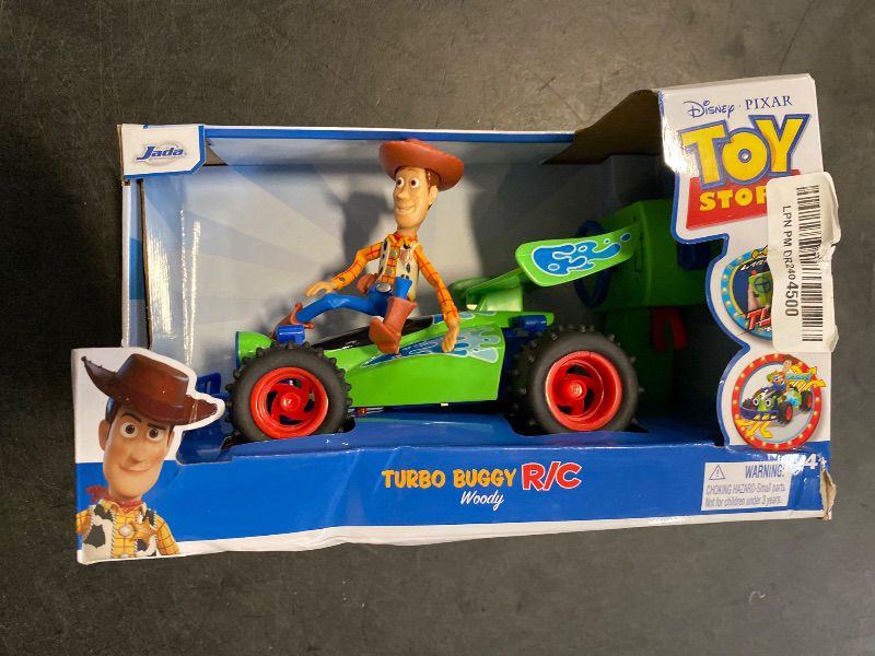 Photo 1 of Jada Toys Jada Disney Pixar Toy Story 4 Turbo Buggy W/Woody Radio Control Vehicle, 2.4 Ghz, 1: 24