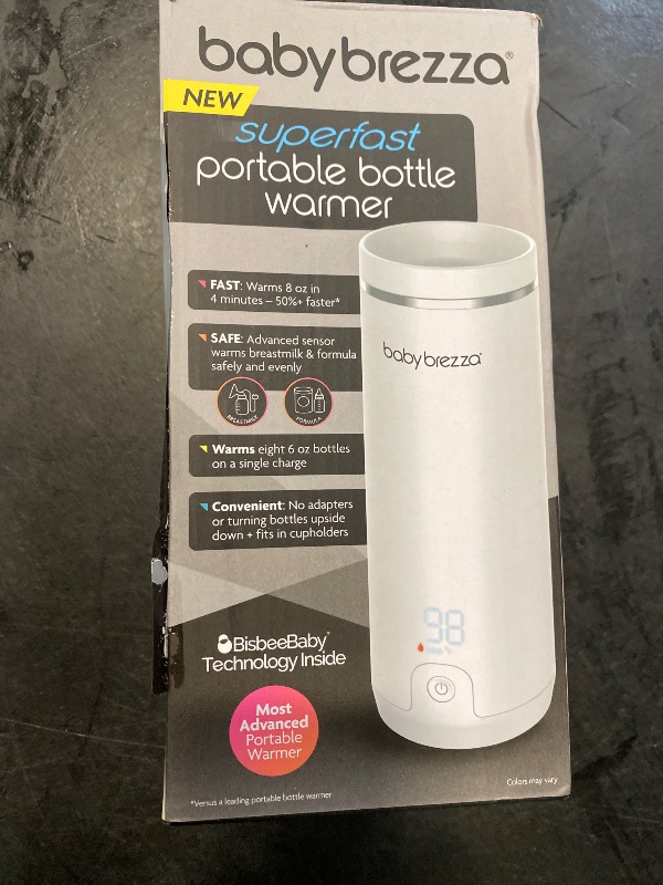 Photo 1 of Baby Brezza Superfast Portable Baby Bottle Warmer – 67% Faster - Travel Breastmilk Warmer and Formula Warmer - Safe, Even Heating - Up to 9oz - No Adapters, White