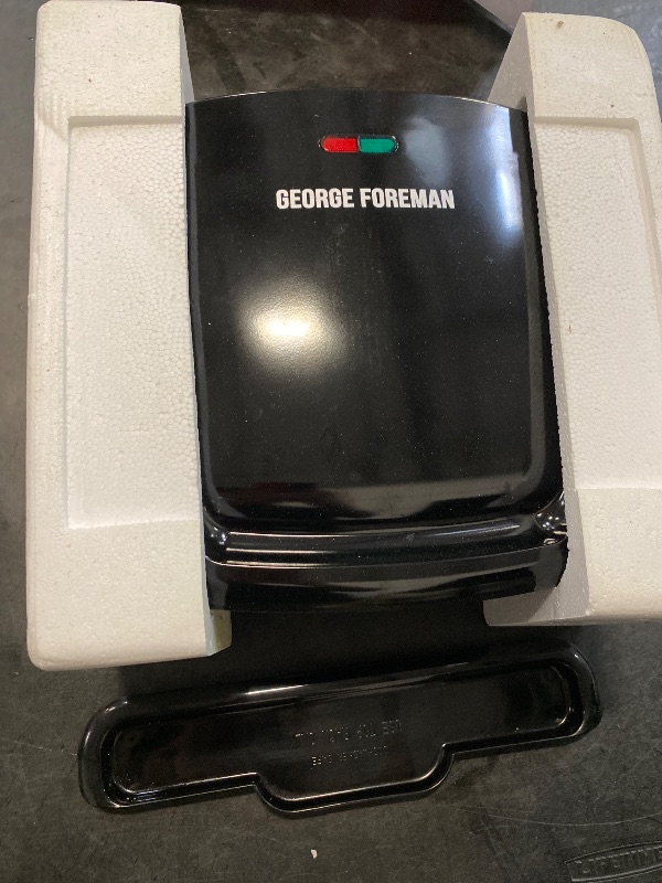 Photo 1 of George Foreman 4-Serving Removable Plate Electric Grill and Panini Press, George Tough Non-Stick Coating, Drip Tray Catches Grease, Black
