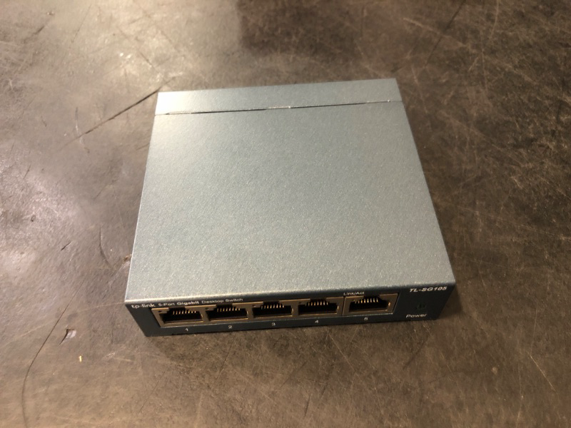 Photo 1 of TP-Link TL-SG105, 5 Port Gigabit Unmanaged Ethernet Switch, Network Hub, Ethernet Splitter, Plug & Play, Fanless Metal Design, Shielded Ports, Traffic Optimization,Navy Blue
