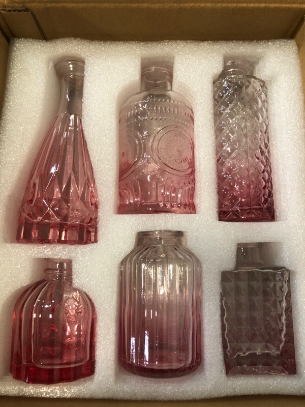 Photo 1 of SUPMIND 12Pcs Glass Bud Vase Set, Small Flower Vase for Centerpieces, Pink Bud Vases in Bulk, Mini Vintage Vase for Rustic Wedding Decorations