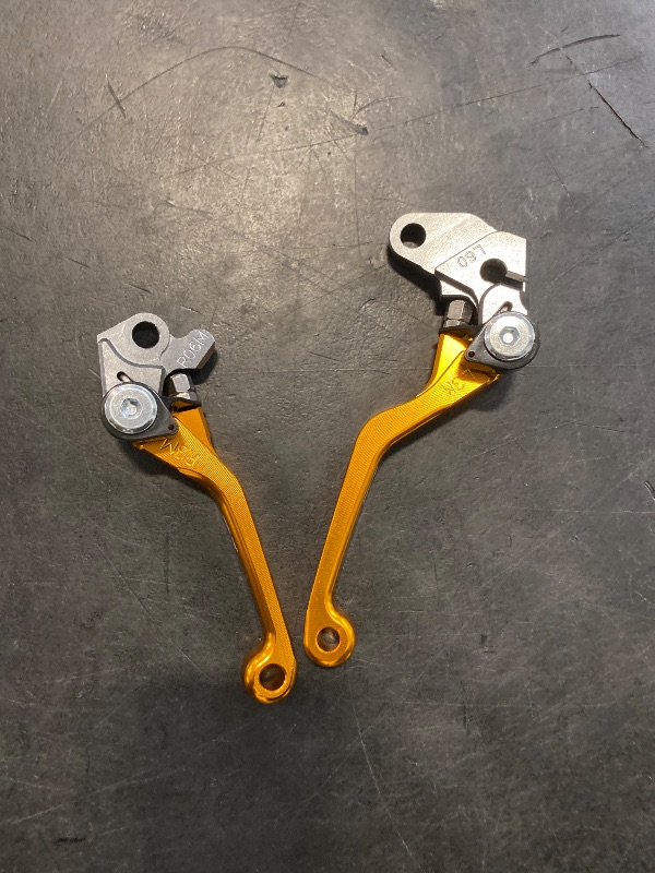 Photo 1 of TIRGE Motorcycle CNC Foldable Pivot Clutch Brake Lever Handle for RM125 RM250 RM 125 250 1996 1997 1998 1999 2000 2001 2002 2003