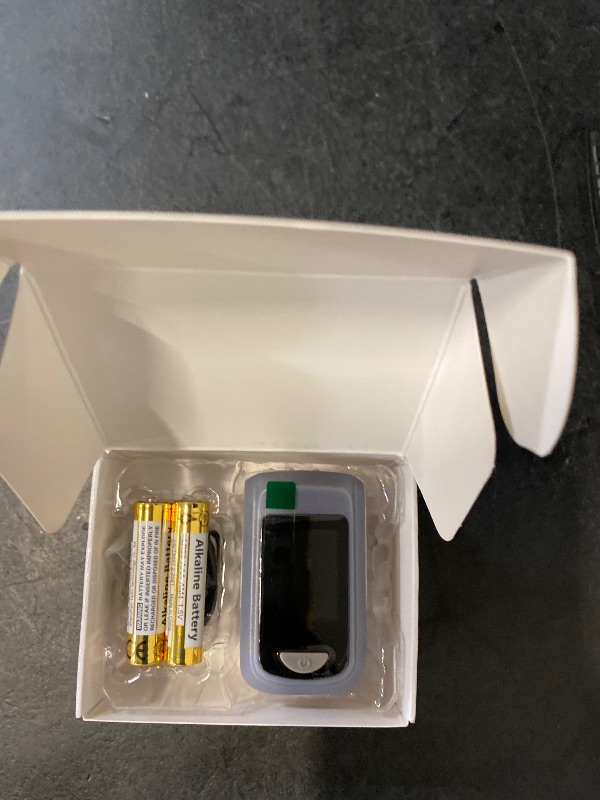 Photo 1 of Fingertip Pulse Oximeter Blood Oxygen Saturation Monitor Pulse Ox, Heart Rate and Fast Spo2 Reading Oxygen Meter with OLED Screen Included Lanyard and 2 X AAA Batteries