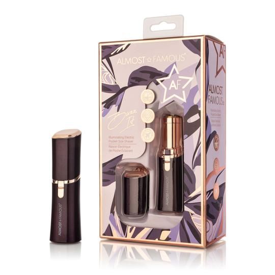 Photo 1 of Purple Buzz IT Gently Removes Unwanted Hair Features 3D Pivoting Head That Follows The Face Contour Batteries Required Not Included New