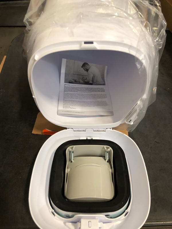 Photo 1 of Diaper Genie Classic Pail Includes 1 Starter Square Refill That can Hold up to 165 Newborn-Sized Diapers.