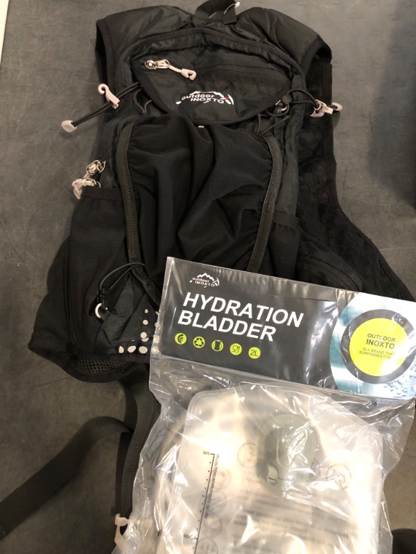 Photo 1 of Hydration Pack Backpack, Lightweight Water Backpack with 2L Leakproof Hydration Bladder Daypack for Men Women,Running Hydration Vest for Outdoor Trail