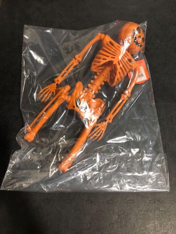 Photo 1 of Hyde and EEK Halloween Skeleton Decor 15.75' Full Body Plastic Mini Little Skeleton Posable Joints Poseable Skeleton for Halloween Party Hanging Decor Yard Lawn Garden Patio Decor