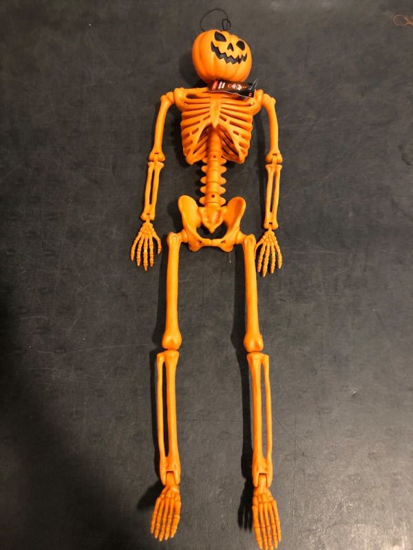 Photo 1 of Hyde and EEK Halloween Skeleton Decor 15.75' Full Body Plastic Mini Little Skeleton Posable Joints Poseable Skeleton for Halloween Party Hanging Decor Yard Lawn Garden Patio Decor