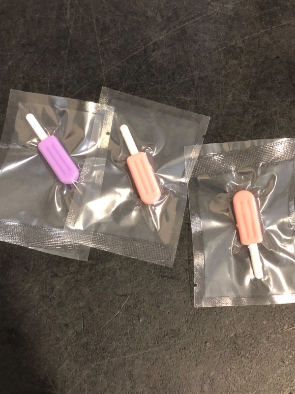 Photo 1 of Chewies for Invisalign Aligner, 4 PCS Popsicle Silicone Chewies with Grip Handles, for Invisible or Metal Braces Aligner Munchies, 2 Grape Flavor and 2 Peach Flavor