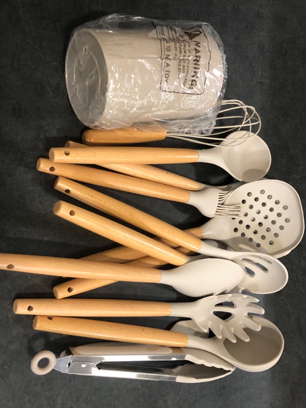 Photo 1 of Silicone Cooking Utensils Set - 446°F Heat Resistant Silicone Kitchen Utensils for Cooking,Kitchen Utensil Spatula Set w Wooden Handles and Holder, BPA FREE Gadgets for Non-Stick Cookware (Khaki)
