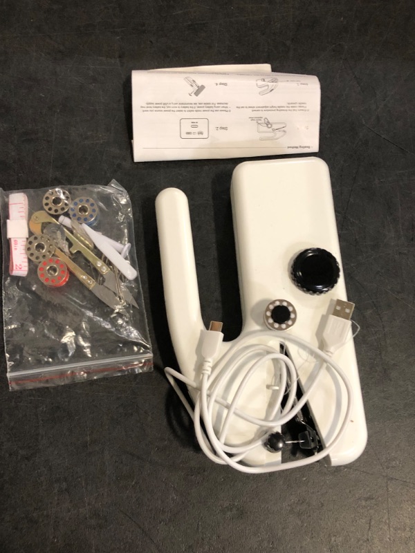 Photo 1 of Natudeco Handheld Sewing Machine Portable Mini Sewing Machine Electric Mending Machine Hand Held Sewing Device for Sewing Clothes DIY Family Travel