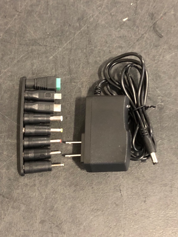 Photo 1 of EIKS AC to DC 9V 1.5A Power Supply Adapter with 5.5mm x 2.1mm Connector Plug for Android Tablets Webcam Routers Toys Recorder Bluetooth Speaker