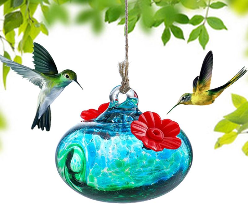 Photo 1 of Blown Glass Hummingbird Feeders for Outdoors Small Glass Hummingbird Feeders to Attract Hummingbirds Ant and Bee Resistant Round Feeder Unique Gifts for Woman - 2 Feeding Ports