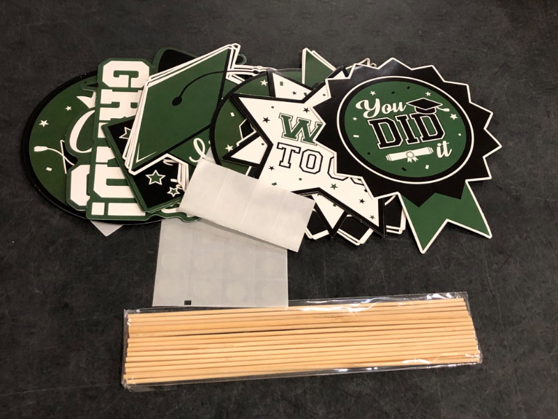 Photo 1 of 24Pcs Graduation Party Decorations Class of 2025, Graduation Centerpieces for Tables, 2025 Congrats Grad Party Centerpiece Stick Table Toppers for Graduation Party Supplies (Green)