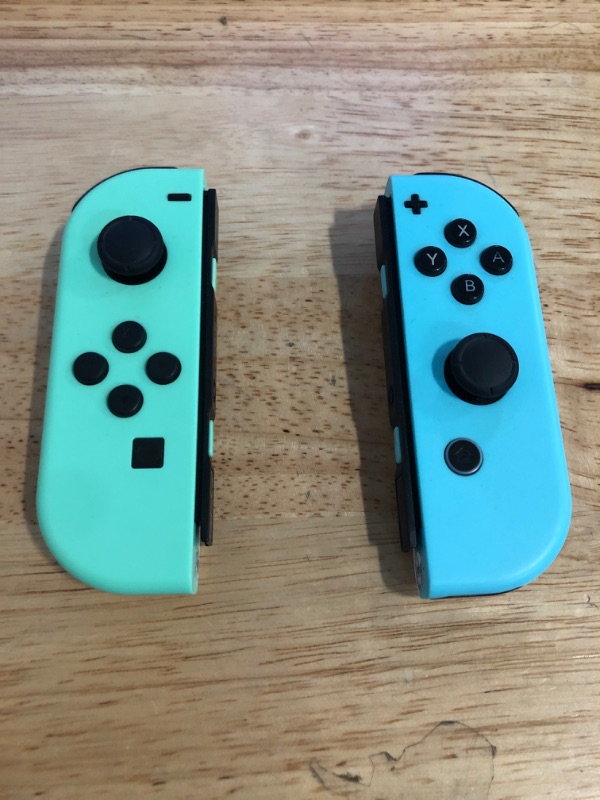 Photo 1 of Replacement for Switch Controller Work with Switch/Lite/OLED,Wireless Gamepad Support Dual Vibration,6-Axis Gyro,Wake-up,Motion Controls,Screenshot, L/R (Green and Blue)