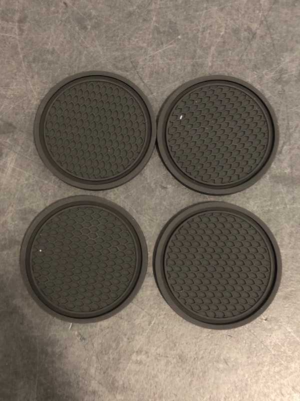 Photo 1 of Car Cup Holder Coaster 4 Pack - Non Slip & Shockproof,Flexible PVC Rubber Insert for Car/Truck/SUV/Van (2.75"x0.2") Universal Fit Auto Cup Holders Accessories for Women and Man (Black)