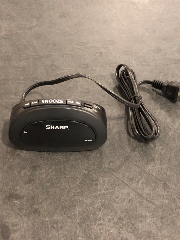 Photo 1 of Sharp Small Digital Alarm Clock with Snooze and Battery Backup, Easy to Use Top Button Controls for Simple Use, Black Case with Red Easy to Read LED Display