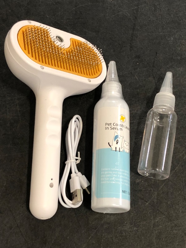 Photo 1 of Pet Steam Brush for Cats and Dogs, 4-in-1 Spray Hair Removal Comb, Water Brush for Shedding and Grooming with 1 Shampoo for Long & Short Haired Pets