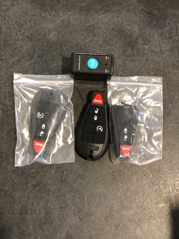 Photo 1 of Missing One Smaller Replacement* GQ4-53T DIY Key Fob Replacement with OBD Tool for Dodge Ram 1500 2013 2014 2015 2016 2017 Ram 3500 Truck Keyless Entry Remote with Interchangeable 3 and 4 Button Key Pads
