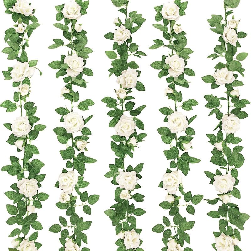 Photo 1 of ZIFTY 5Pcs 32.5FT White Flower Garland Fake Vines Faux Artificial Floral Garland for Wedding Decortions Hanging Rose Ivy for Arch Garden Ceremony Background Outdoor Wall Decor