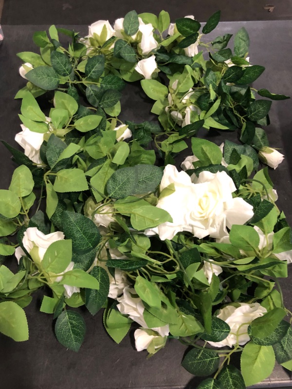 Photo 1 of ZIFTY 5Pcs 32.5FT White Flower Garland Fake Vines Faux Artificial Floral Garland for Wedding Decortions Hanging Rose Ivy for Arch Garden Ceremony Background Outdoor Wall Decor