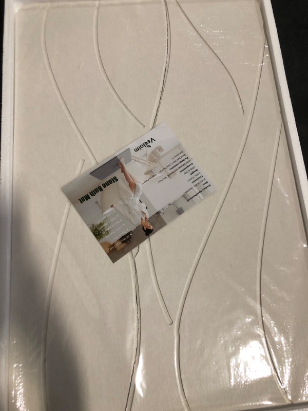 Photo 1 of *Crack down the Mat** Stone Bath Mat Diatomaceous Earth Shower Mat Non-Slip Super Absorbent Diatomite Stone Bath Mats for Bathroom Floor Quick Drying Natural Easy to Clean(23.6''×15.4" White)
