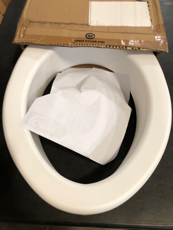 Photo 1 of Carex Toilet Seat Riser, Elongated Raised Toilet Seat Adds 3.5 inches to Toilet Height, for Assistance Bending or Sitting, 300 Pound Weight Capacity Toilet Riser
