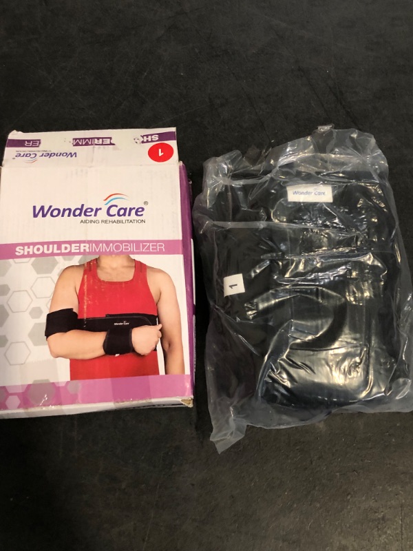 Photo 1 of Size 1 27"- 30" Wonder Care-Left Right Shoulder Immobilizer Arm Sling Elastic Brace for Clavicle Collar Bone Dislocation Subluxation Shoulder stabilizer Compression Brace After Rotator Cuff Surgery - Black-Size 1
