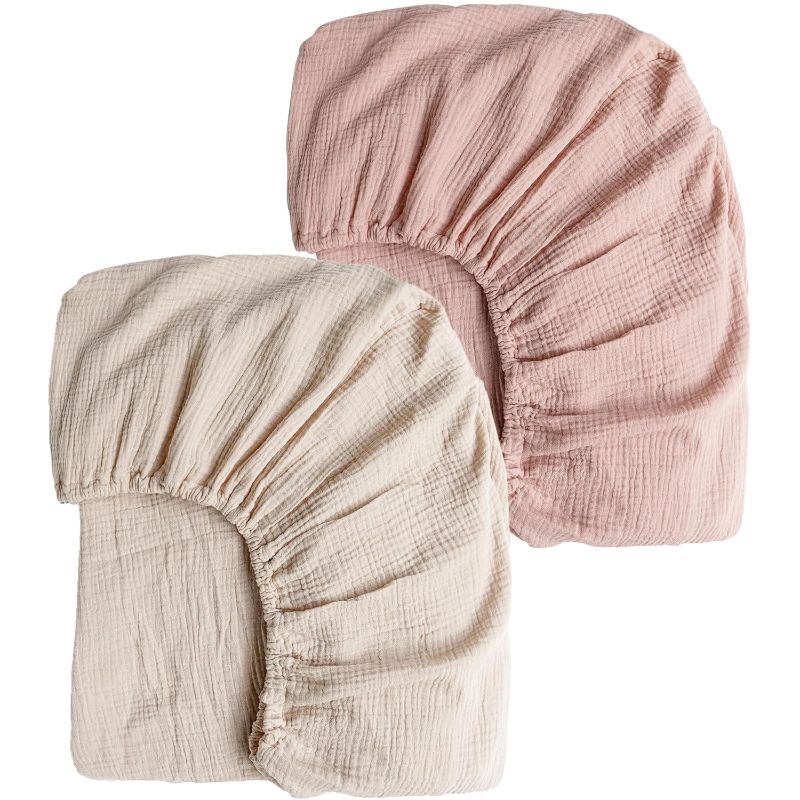 Photo 1 of Konssy Muslin Crib Sheets for Girl Boy, 2 PCS Soft and Breathable Cotton Baby Sheets for Standard Crib Mattress, 52"x 28" (Pink, Cream)
