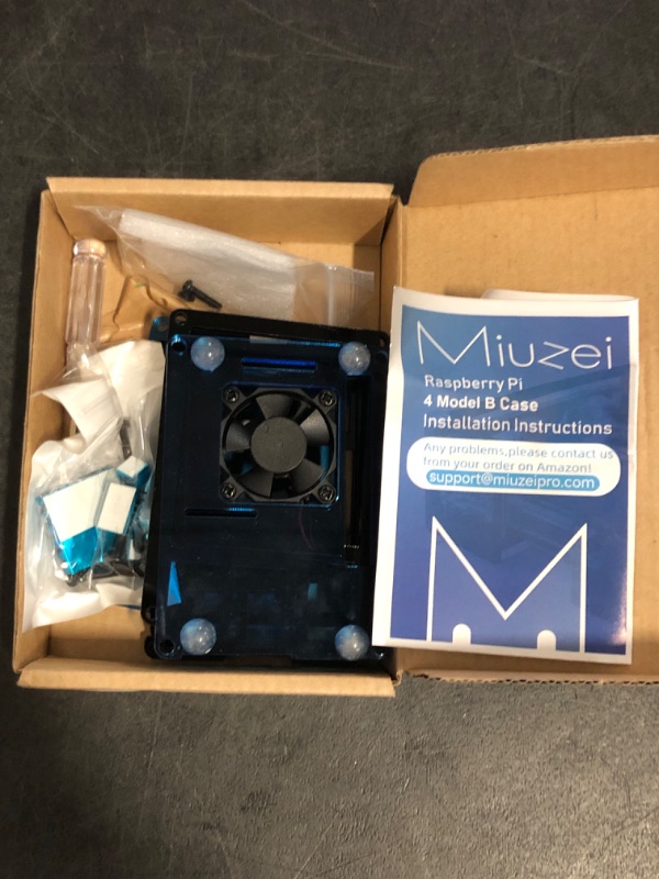 Photo 1 of Miuzei Raspberry Pi 4 Case with Fan Cooling , 4 Pcs Aluminum Heat Sinks , Case for Raspberry Pi 4 Model B -Black/Blue (Pi 4 Board Not Included)
