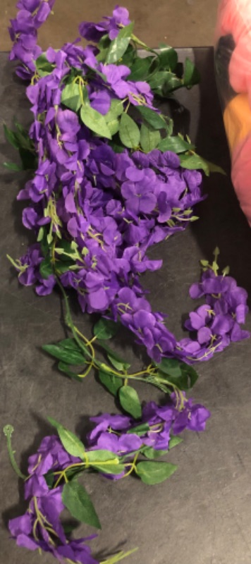 Photo 1 of CISDUEO 1 Pcs Wisteria Hanging Flowers Vines Purple Wisteria Flowers Vine Garland Artificial Wisteria Vines Hanging Flower Silk for Wedding Arch Party Garden Home Decor Table Backdrop 6 Feet
