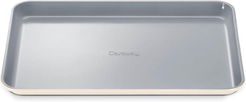 Photo 1 of Caraway Non-Stick Ceramic Baking Sheet - Naturally Slick Ceramic Coating - Non-Toxic, PTFE & PFOA Free - Perfect for Baking, Roasting, and More - Medium (15" x 10") - Cream
