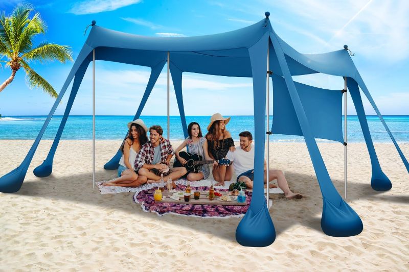 Photo 1 of Beach Tent Sun Shelter & Portable Beach Canopy UPF80+ Uv Protection, Beach Shade Canopy/Cabana with 8 Sandbags, 4 Stability Poles, Sand Shovel Ground Pegs for Outdoor Camping(10x10ft, Navy Blue)

